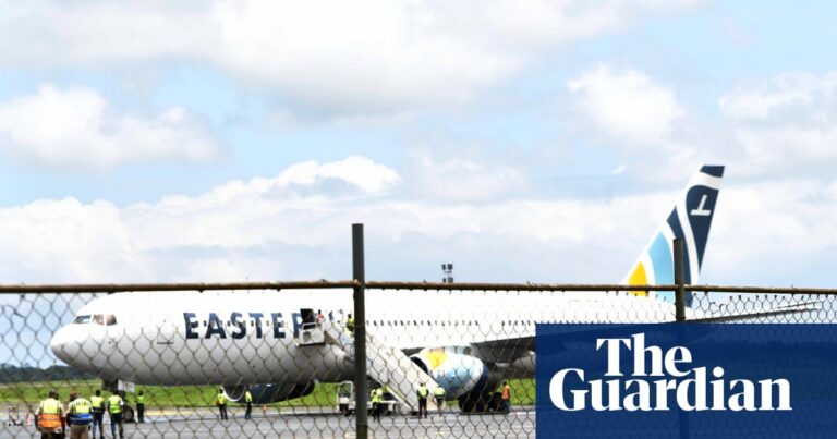 A passenger plane on the tarmac at Roberts International Airport in Monrovia, Liberia, after arriving with deportees from the United States.