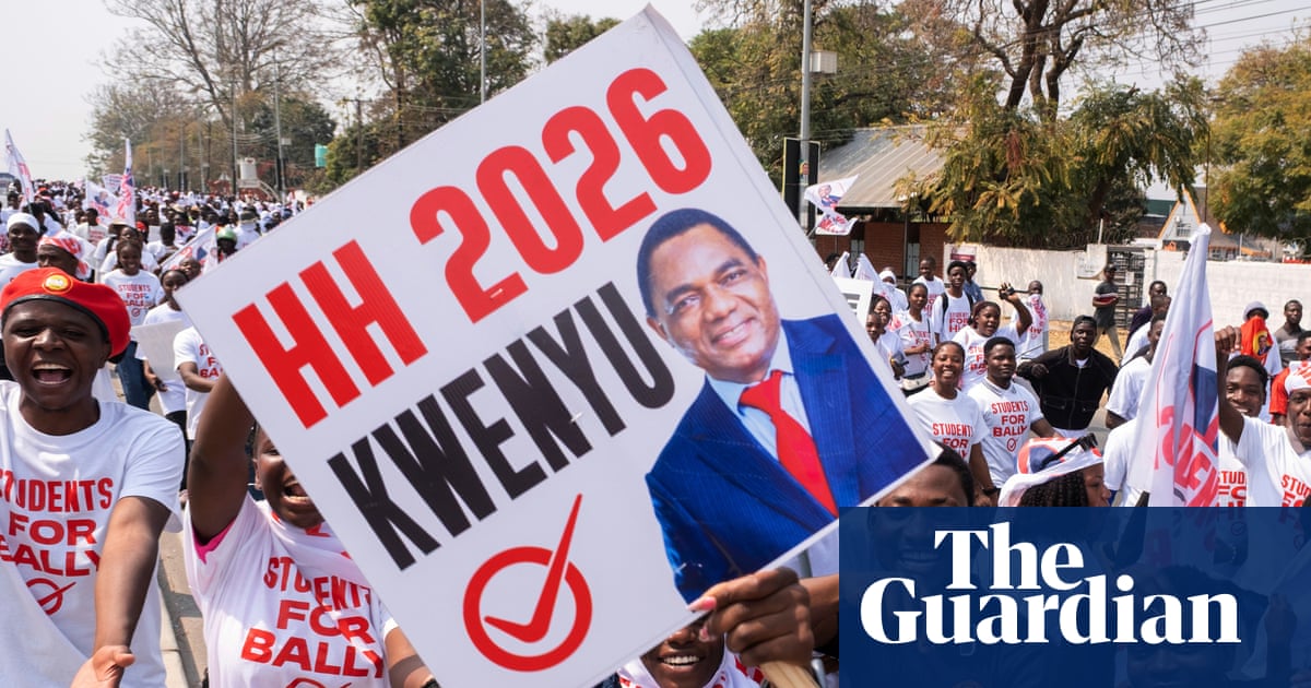 Zambian President Hakainde Hichilema campaigning in Lusaka with supporters holding 'HH 2026' signs.