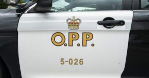 OPP cruiser near Georgian Bay, symbolizing the ongoing investigation into a tragic marine incident.