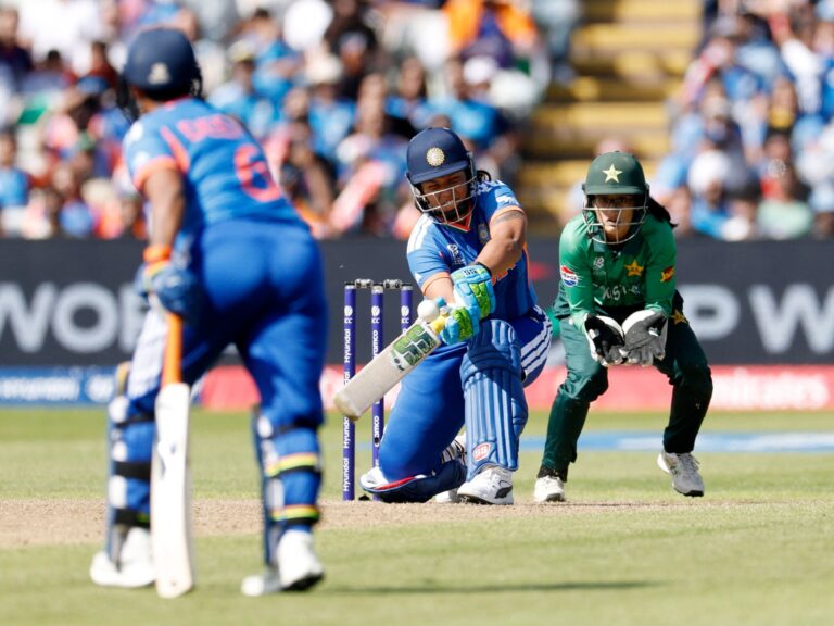 India's Richa Ghosh bats during a World Cup match against Pakistan, a crucial moment in the India Pakistan T20 rivalry.