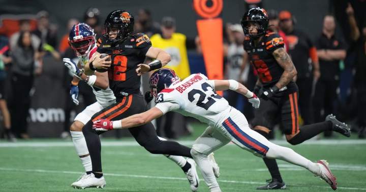 B.C. Lions quarterback Nathan Rourke running with the ball against the Montreal Alouettes during a CFL game.