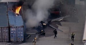 Image of first responders at the scene of a helicopter crash in Chatsworth, Los Angeles, near a bus collision.