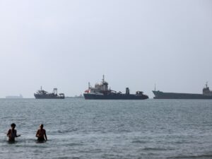 News article detailing the increase in oil prices due to US-Iran strikes in the Strait of Hormuz.