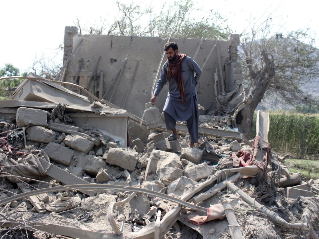 A damaged residential area in Afghanistan following recent military operations.