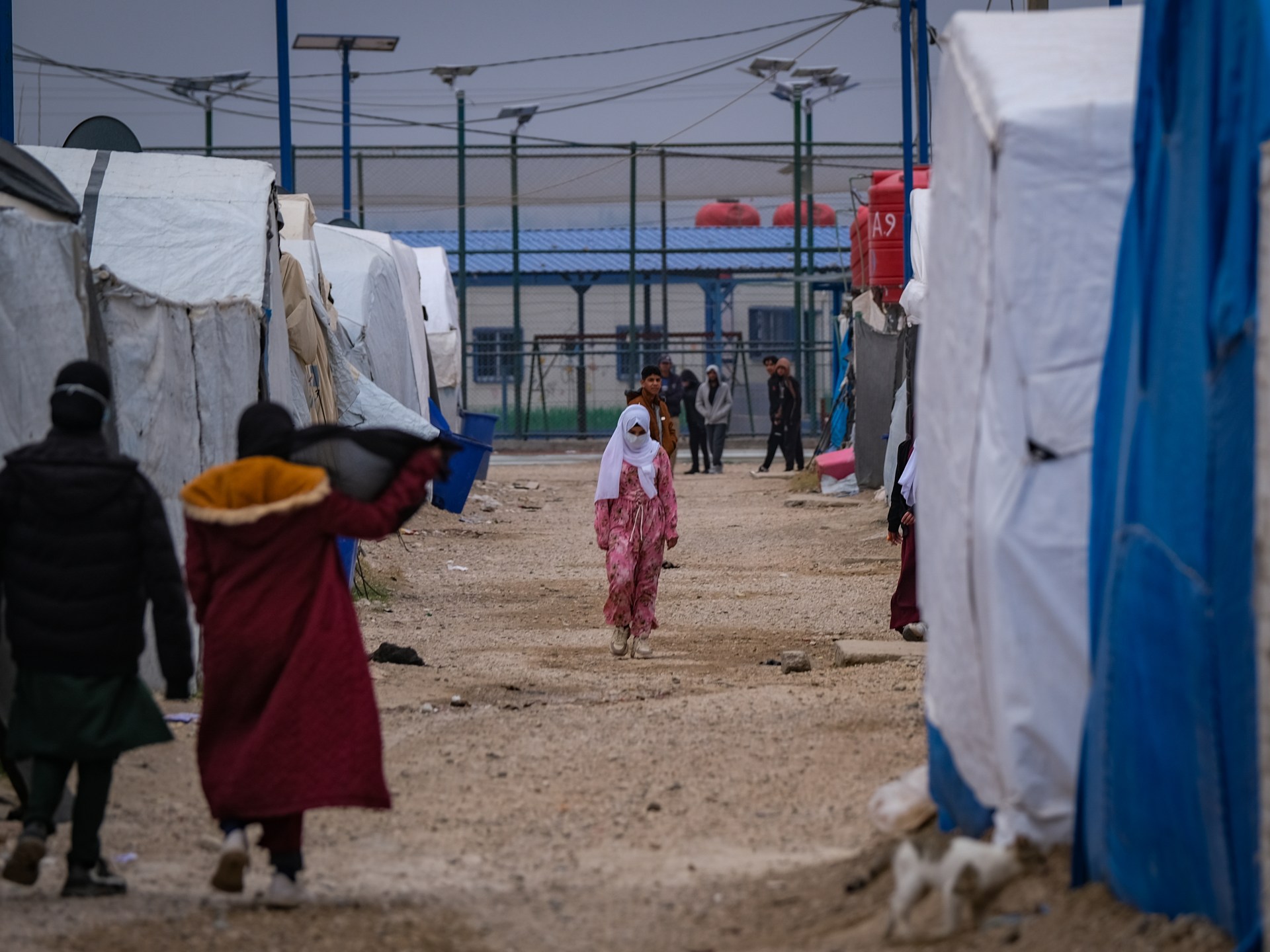 A desolate view of the fenced detention site in Syria where thousands of women and children remain in arbitrary detention.