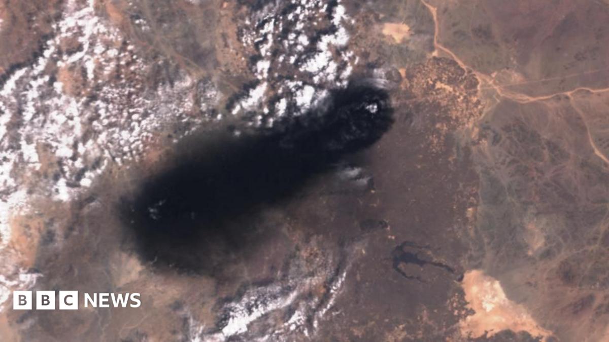 Satellite image showing scorched ground near a damaged oil pipeline, indicating a drone attack.