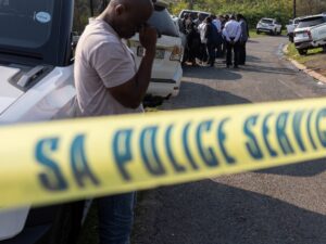 A police cordon at a crime scene following a mass shooting incident in South Africa.