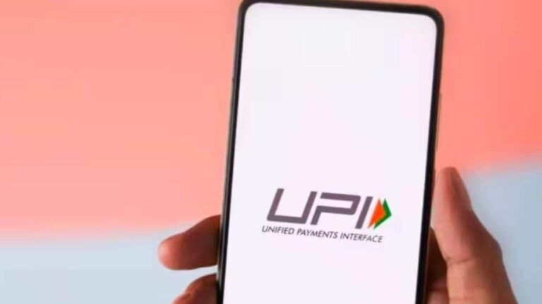 Illustrative image showing mobile phones with UPI payment interfaces and RuPay debit cards, symbolizing India's digital transaction growth.