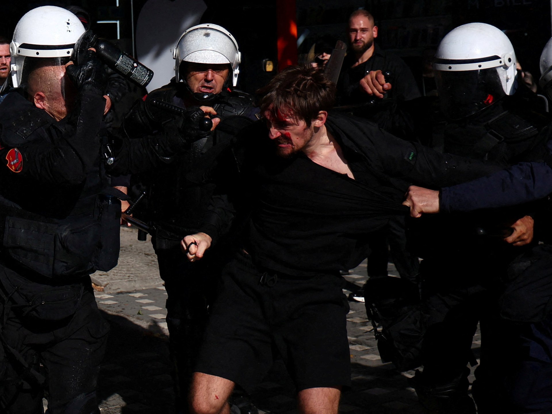 Value: Riot police and students clashing during an antigovernment protest in Tirana, Albania.