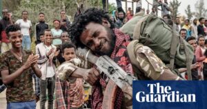 A photograph showing the impact of the ongoing conflict in Ethiopia as fighters and civilians navigate the volatile region.