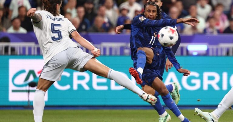 Michael Olise takes a shot during the UEFA Nations League match at the Stade de France