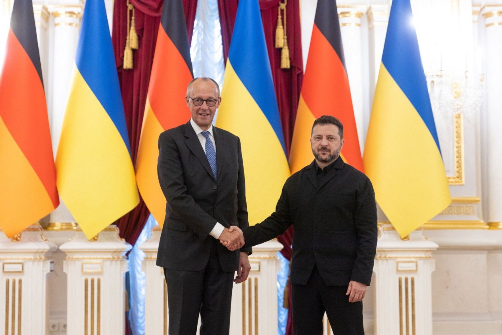 German Chancellor Friedrich Merz announces significant aid package during surprise visit to Kyiv.