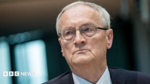 German spy chief August Hanning faces legal scrutiny after being arrested for alleged treason and espionage activities.