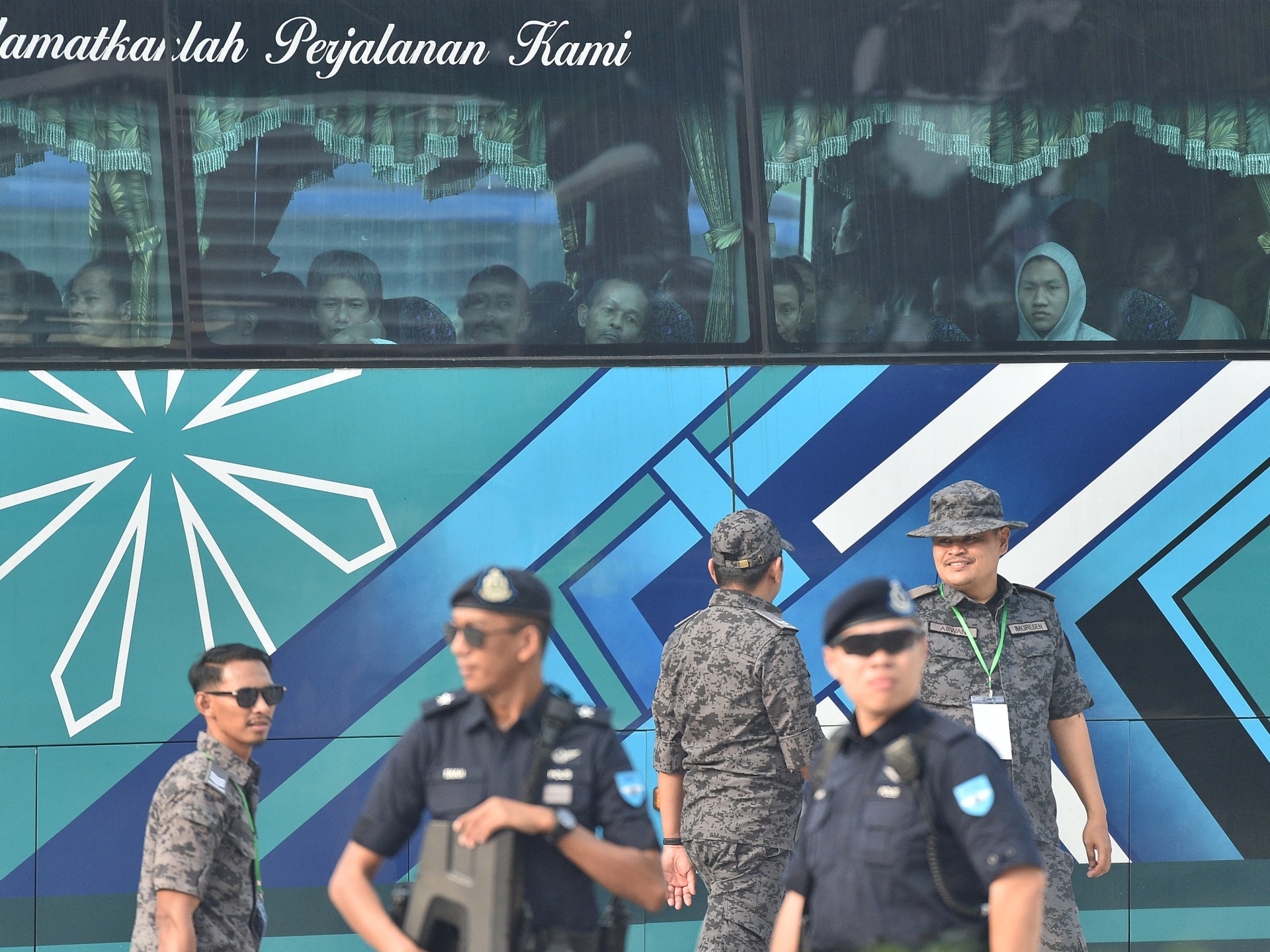 A military ship transporting Myanmar refugees back to a conflict zone despite human rights warnings.