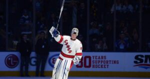 Value: An NHL emergency backup goalie wearing the number 00 jersey during a team practice session.