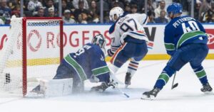 Connor McDavid leads the Edmonton Oilers to a 9-7 victory over the Vancouver Canucks in a historic NHL scoring display.