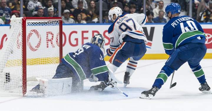 Connor McDavid leads the Edmonton Oilers to a 9-7 victory over the Vancouver Canucks in a historic NHL scoring display.