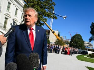 US President Donald Trump faces legal challenges over the use of government funds for political television advertisements.