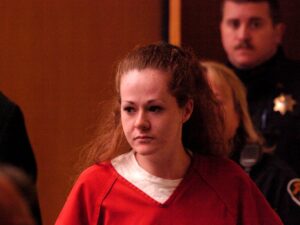 A photograph showing death row inmate Christa Pike in a Tennessee courtroom, serving as a reminder of the ongoing national debate surrounding capital punishment.