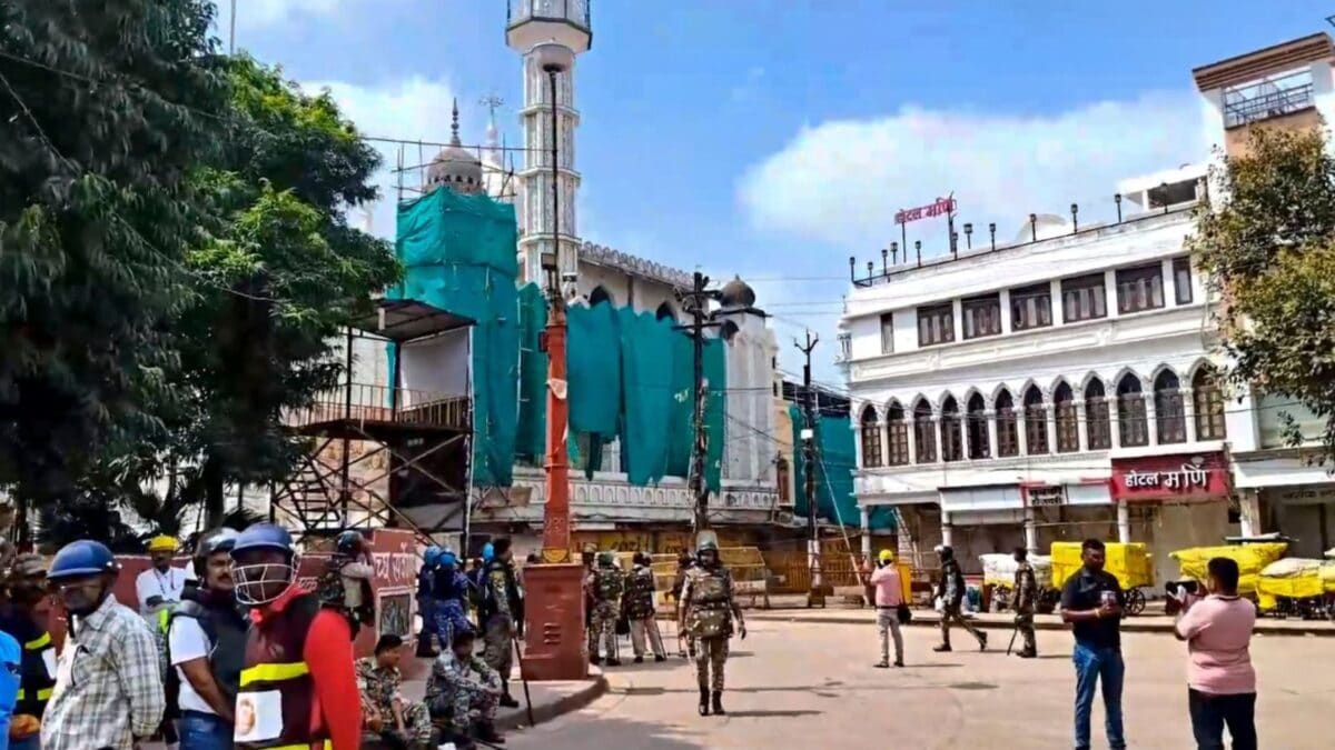 A scene depicting the infrastructure road widening project impacting the Shahi Mosque in Ujjain.