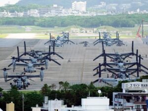 Protesters gather in Japan after a US Marine is arrested in connection with a killing in Okinawa.
