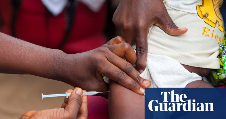 Value: An infant receiving a standard vaccination during a medical outreach program.