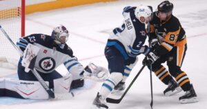 Winnipeg Jets celebrate a 3-2 victory over the Pittsburgh Penguins.
