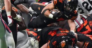 Zander Horvath in action for the B.C. Lions during a CFL game.